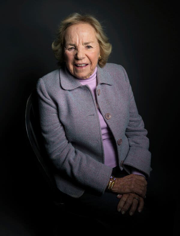 A portrait of Ethel Kennedy, who is wearing a bluish purple jacket over a lavender-colored turtleneck.